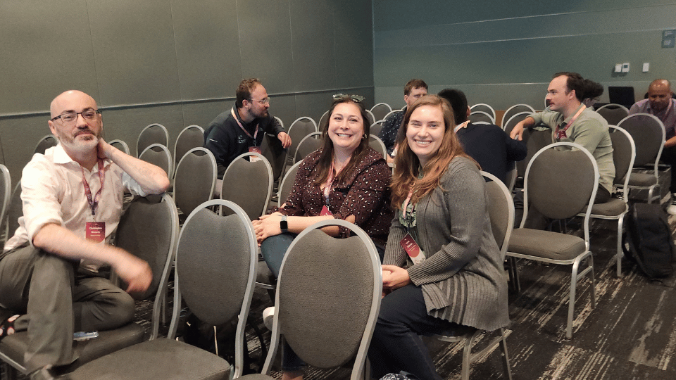 Contributors collaborating at a conference sprint