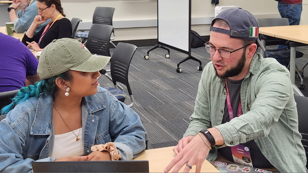 Three people collaborating during a pyOpenSci sprint.